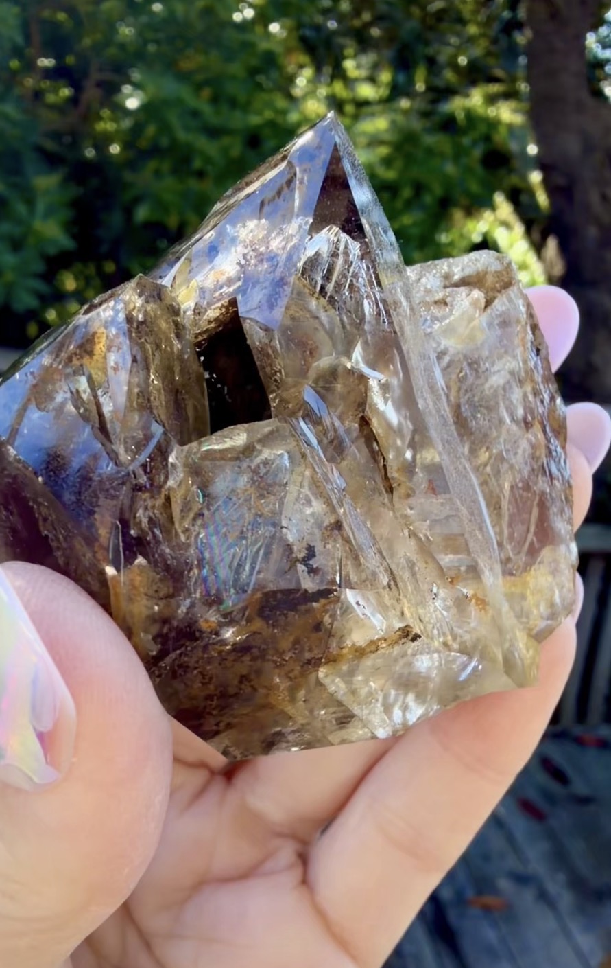 Herkimer diamond crystal held in a hand at Fonda Mountain